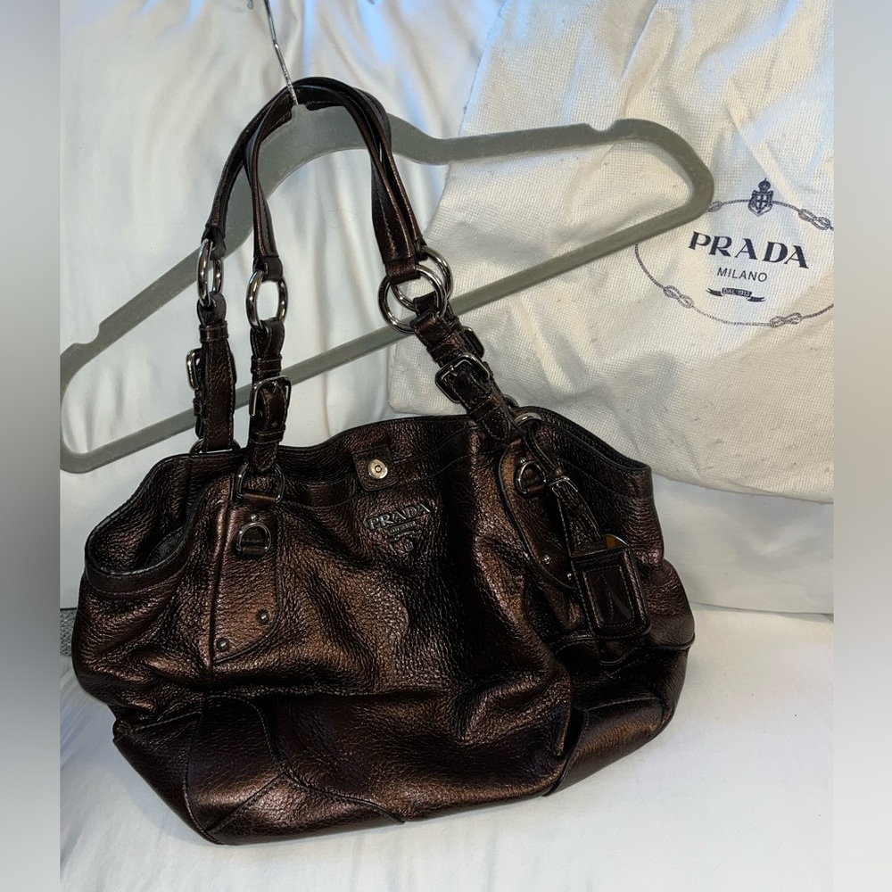 Beautiful bronze soft leather Prada purse. Used once.